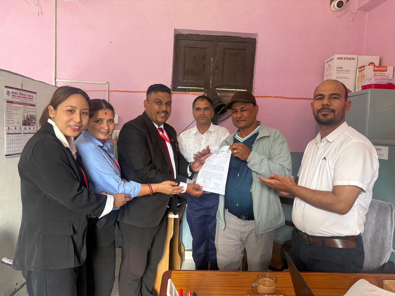 Laptop Handover by Machhapuchre Branch